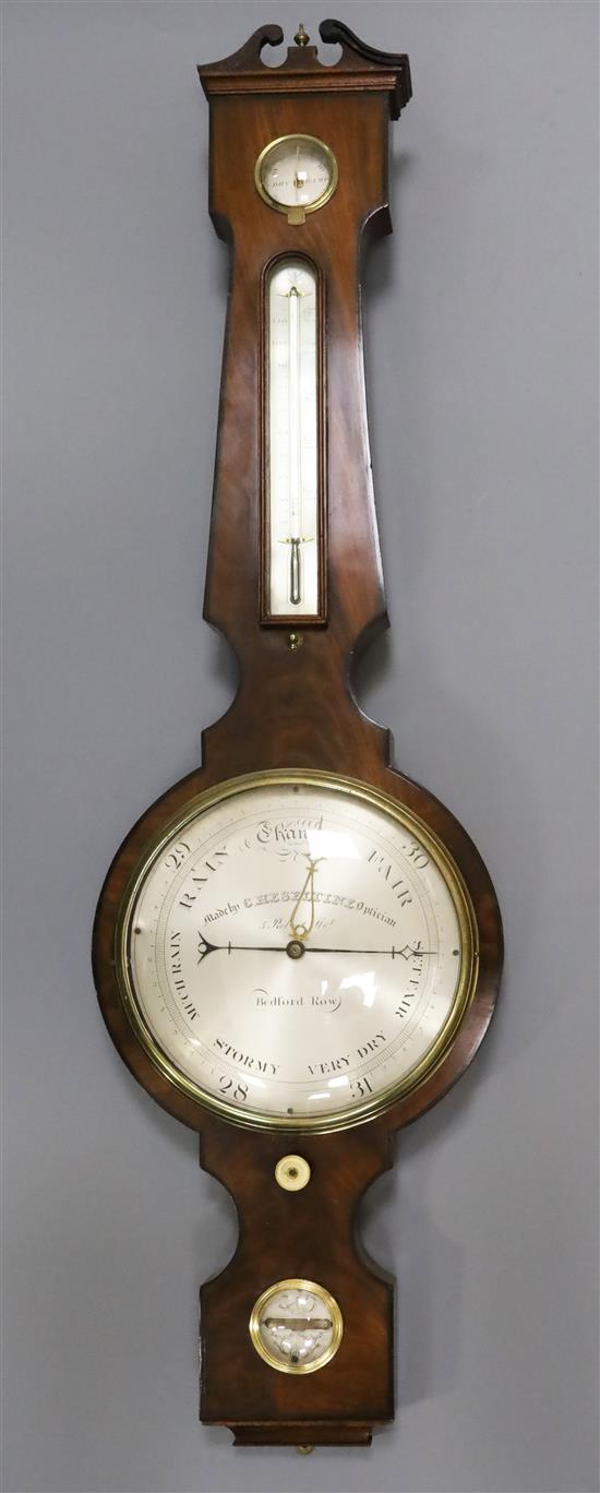 C.Heseltine, Bedford Row. A Regency mahogany wheel barometer 44in.